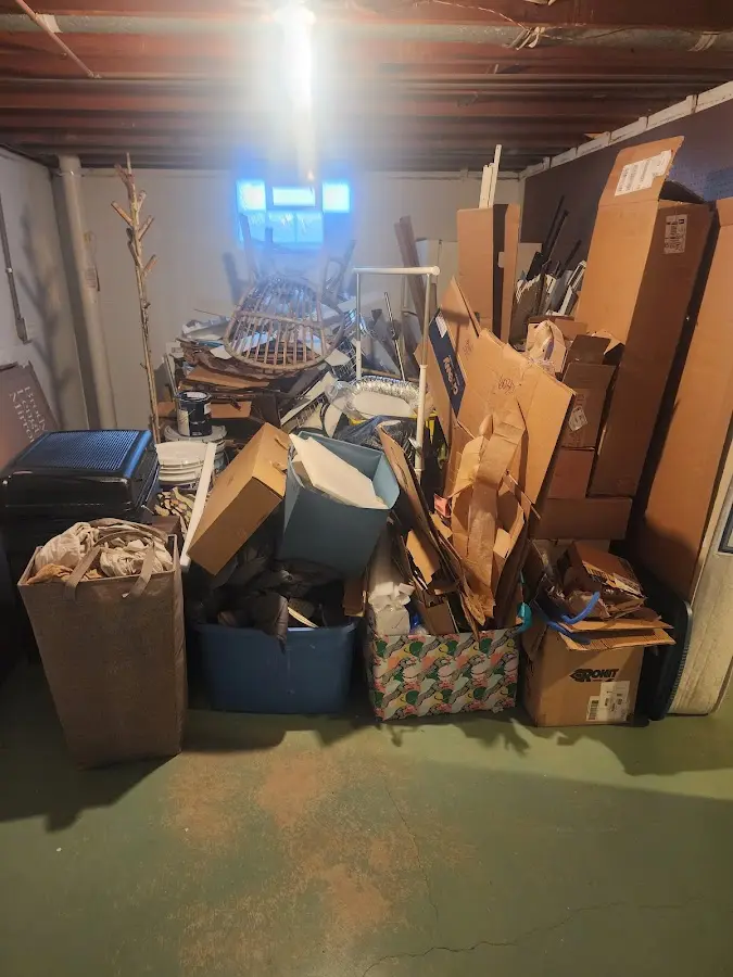 Roll-off dumpster container at job site for Yard Waste Dumpster Rental in Freetown